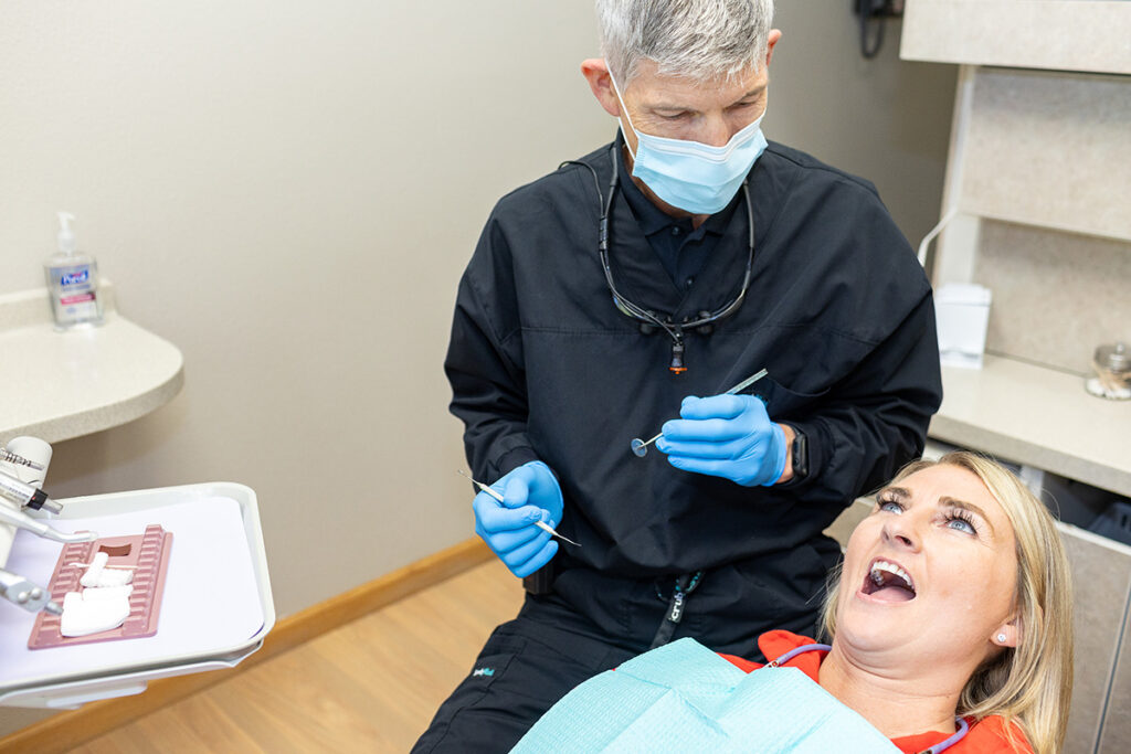 Dr. Stephenson working with a patient at Matlock Dental in Eugene, Oregon.