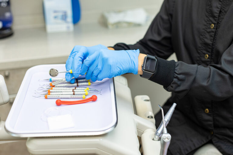 A hygienist selecting her tools at Matlock Dental in Eugene, Oregon.